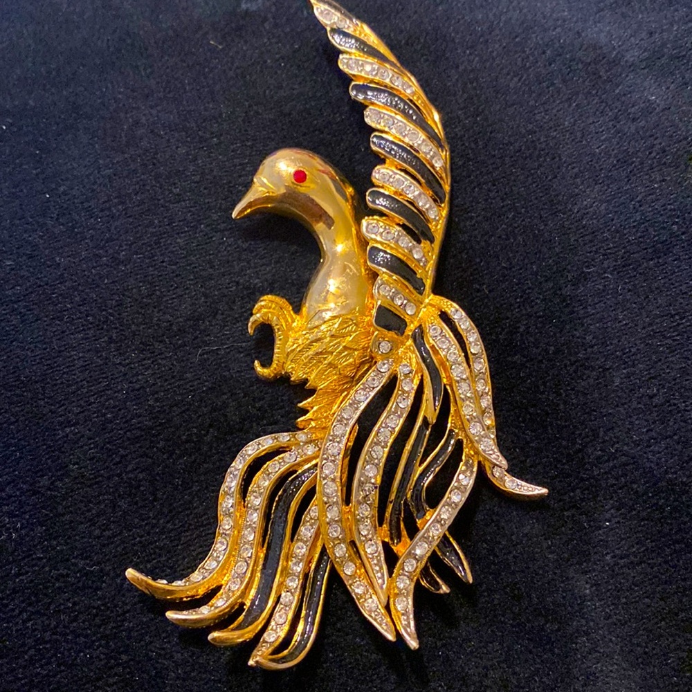 Gold bird brooch